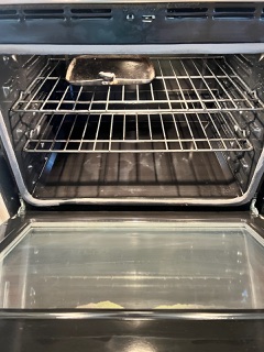 Oven interior after cleaning, racks and glass clean